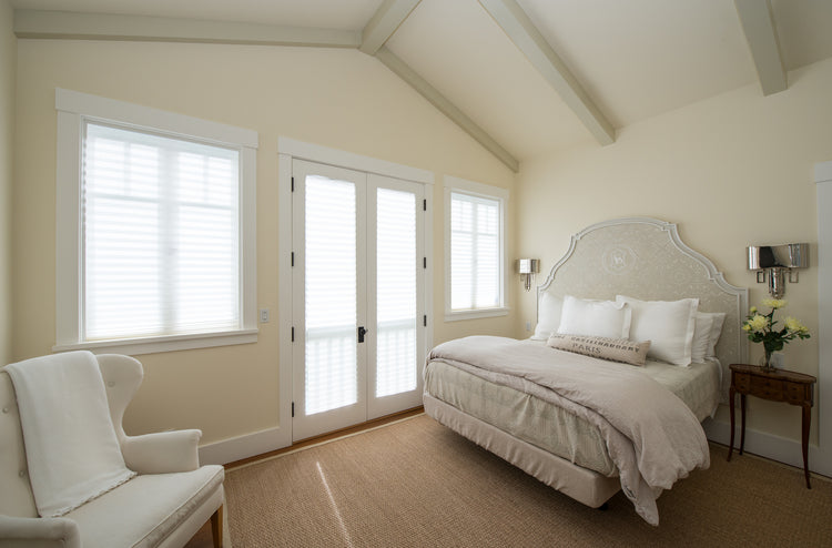Original light filtering white bedroom